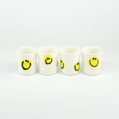 frizbee ceramics espresso cups smiley face logo