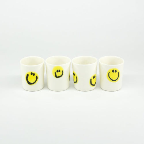 frizbee ceramics espresso cups smiley face logo