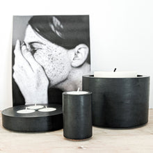 Load image into Gallery viewer, concrete and wax black concrete pot with threewick soy candle lifestyle shot
