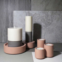 Load image into Gallery viewer, Concrete and Wax Hand Poured Soy Wax candle Trio Tealight Candle Holder Set Blush Pink and grey Lifestyle shot
