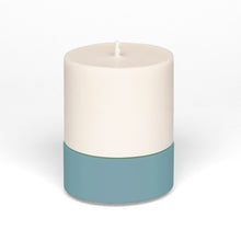 Load image into Gallery viewer, concrete and wax hand poured vegan soy large candle on a teal blue concrete holder
