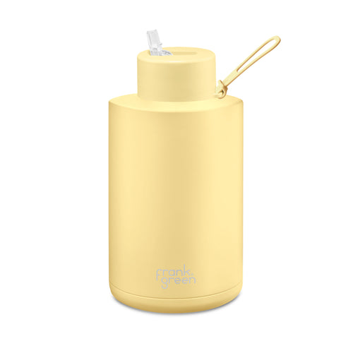 Frank Green 68oz 2L Ceramic Reusable Bottle with straw lid in pale yellow
